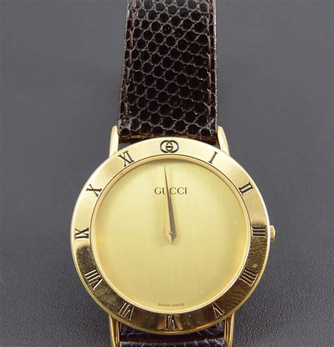 old gucci gold face analog watch diamond roman numermals|old Gucci watches worth money.